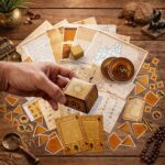 Egypt scavenger hunt for kids with riddles, printable cards, and hieroglyph dice on wooden table